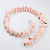 Ракушка гладкая на нити 45 см персиковая